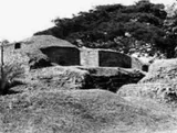 Early black-and-white photograph of the Charpatra Mura ruins