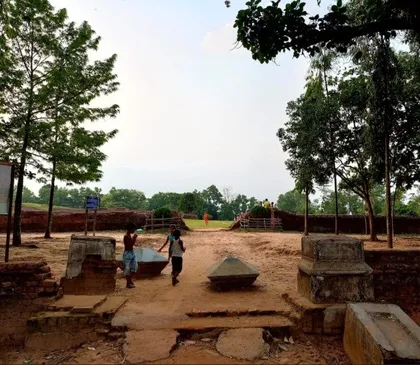 Visitors among the brick remains of Queen Mainamati's palace