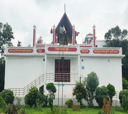The white main building of New Salban Vihara with its red-trimmed gable